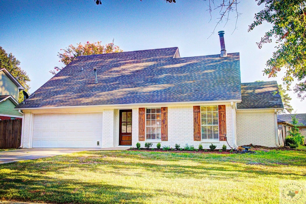 122 Presidio Place, Wake Village, TX 75501 - photo 1