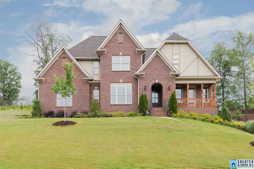 Impressive curb appeal on corner lot. Four sides b