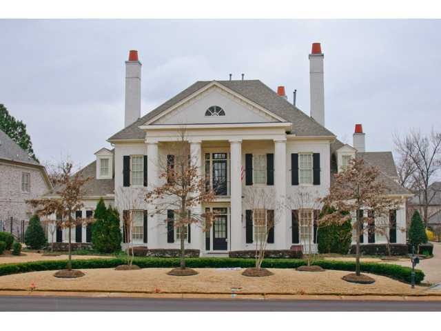 Another view of exterior!   Yes, 4 chimneys!