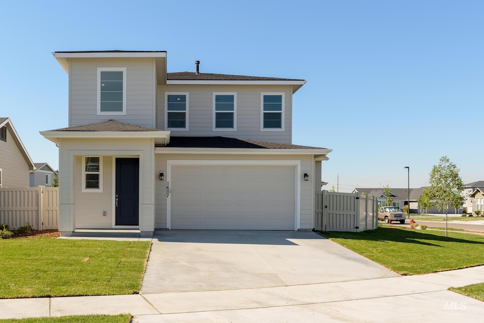 View of front of home with roof with shingles, concrete driveway, a garage, and covered porch