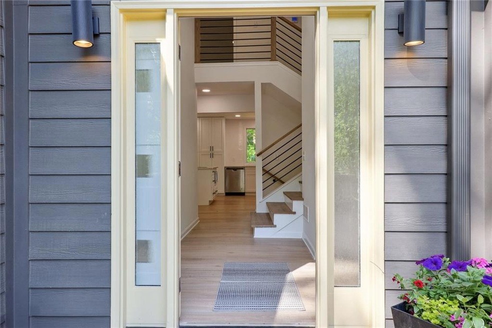 Two story foyer with new stairs and railings
