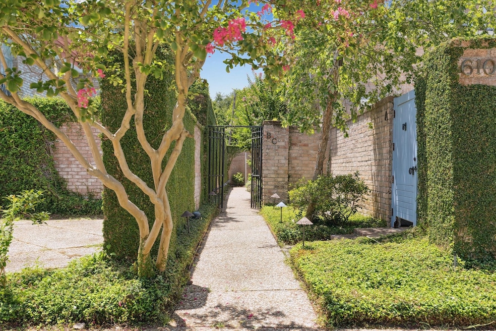 A luscious entrance to 6103 Valley Forge Unit C! Tucked away in a community of just three residences, Unit C is located at the back of the community behind the gate.