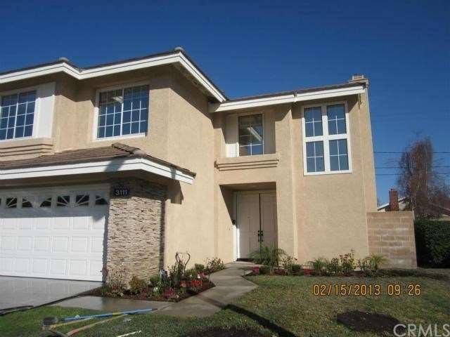 Front of Home showing Double Door Entry & Some Cus