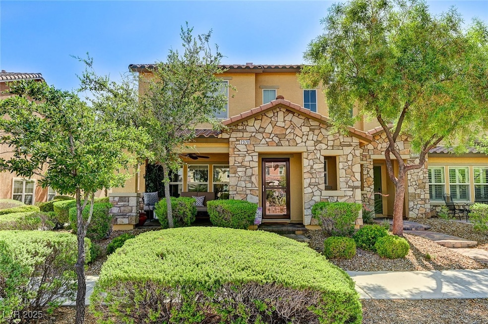 Mediterranean / spanish-style home featuring stone
