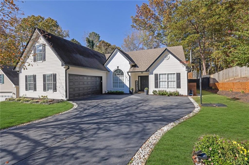 View of front of house with a front yard
