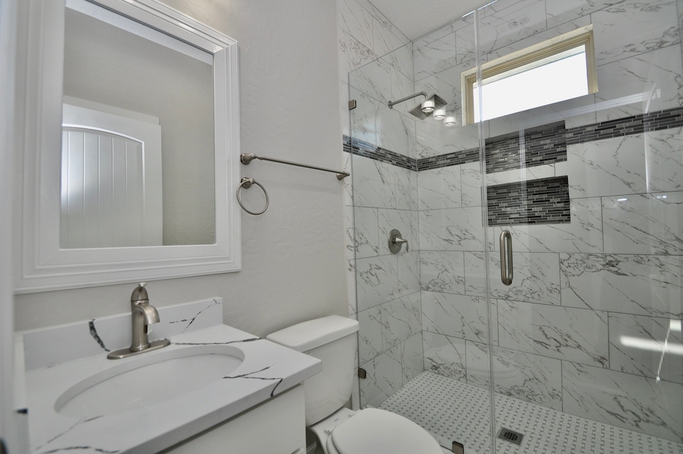 977 Lucky St, Houston, TX 77088 - photo 1