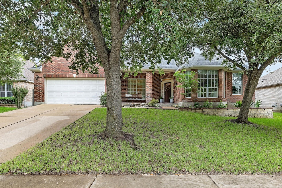 View of front of home featuring concrete driveway