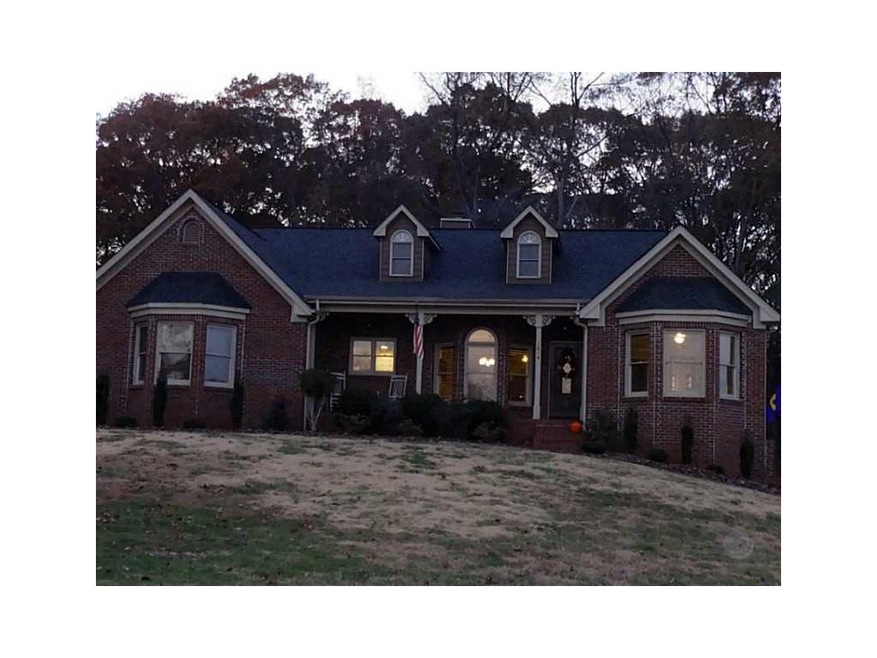Exterior Front. Brick and Hardie Plank exterior.  