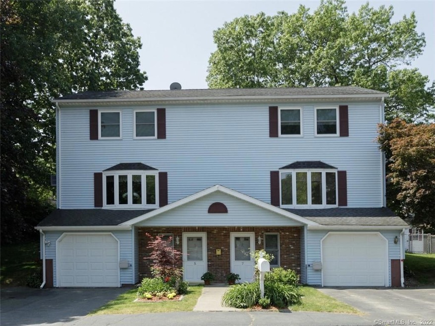 Main Entrances with individual driveways and garages