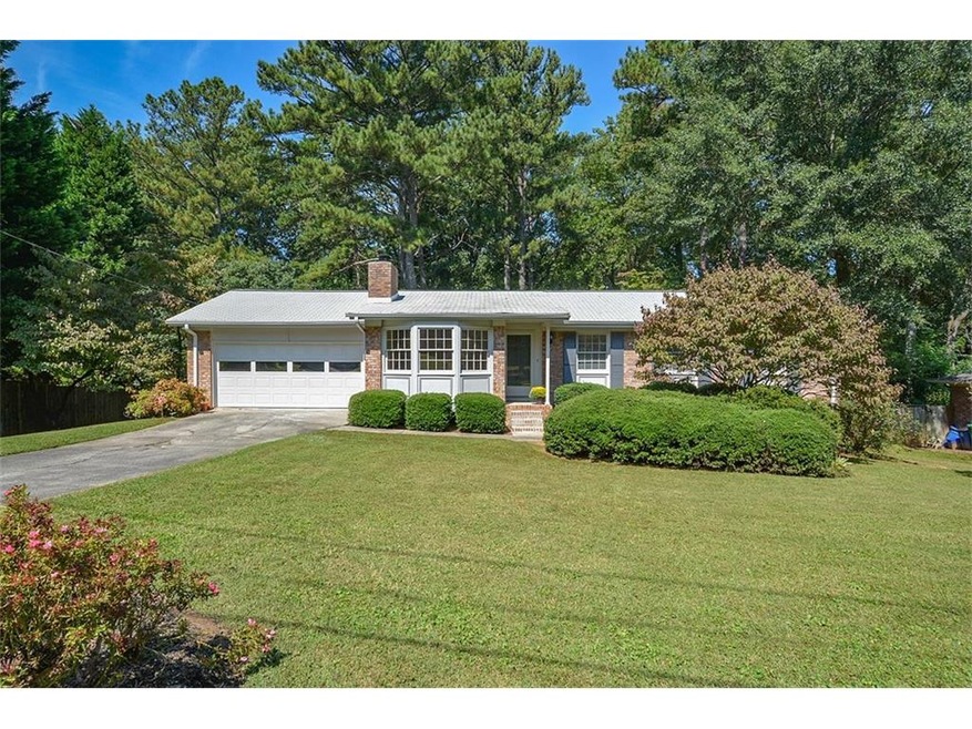 Beautiful Ranch on half acre lot. Four Sides Brick
