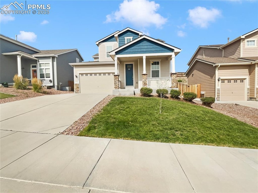 7030 Dutch Loop, Colorado Springs, CO 80925 - photo 1