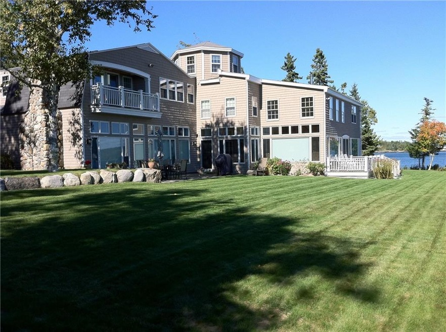 Water side of house with expansive...