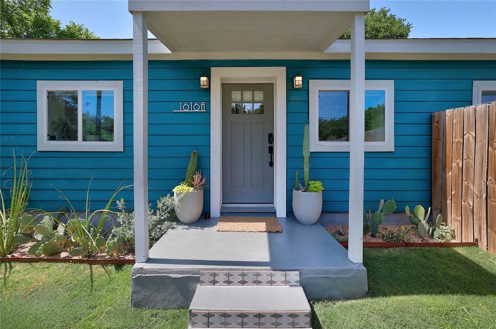 View of exterior entry with fence