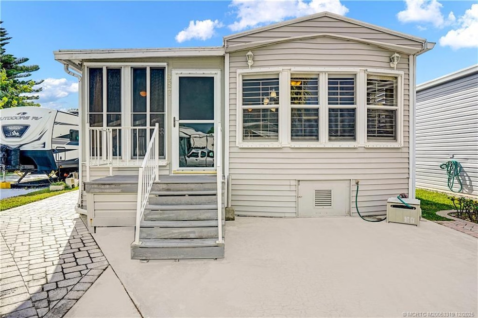 587 Nettles Blvd, Jensen Beach, FL 34957 - photo 1