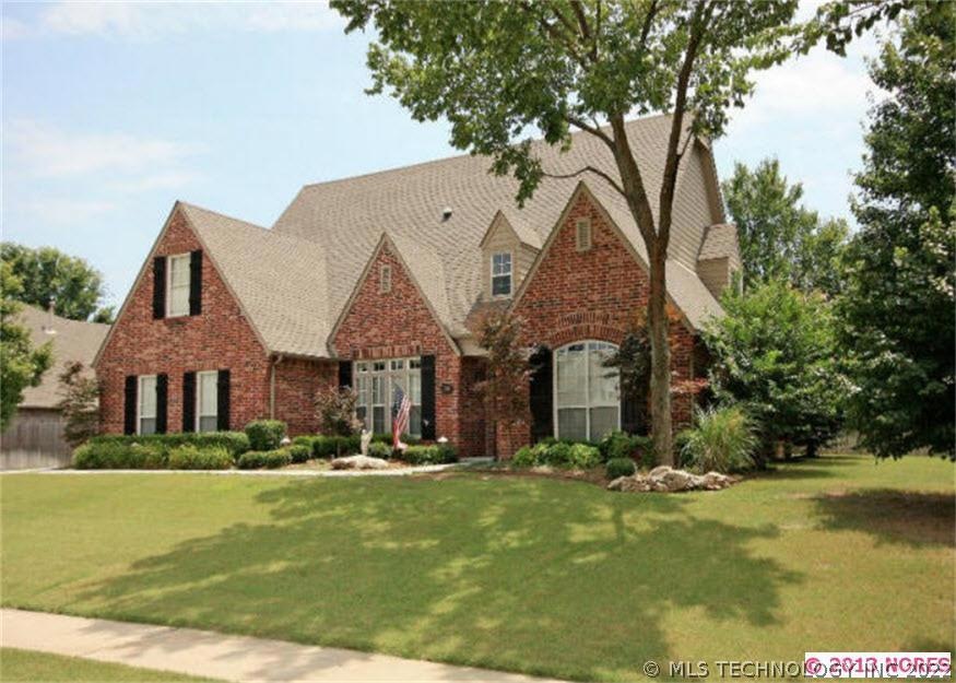 Gorgeous full brick home with mature trees;  sits