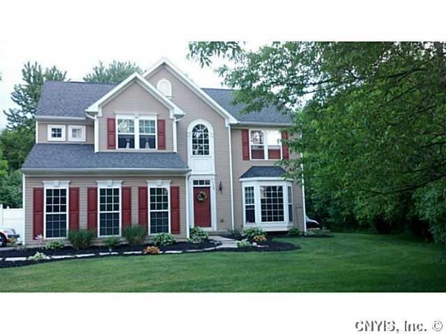 Exterior Front stunning home situated on private 2