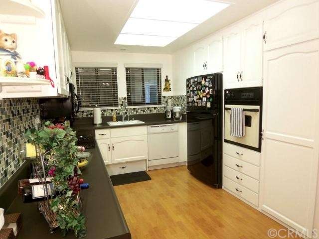 Kitchen updated with new back splash, counter, sin