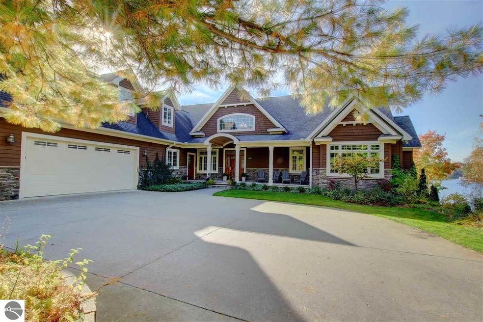 Three car garage and circle drive with multi-level