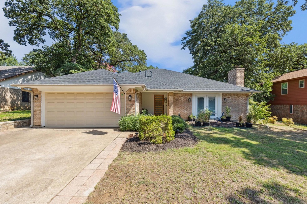 Welcome to 1514 Tiffany Forest Lane in Grapevine!