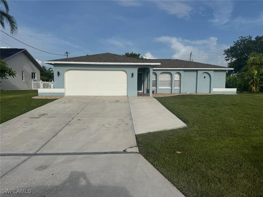 Single story home with stucco siding, concrete dri
