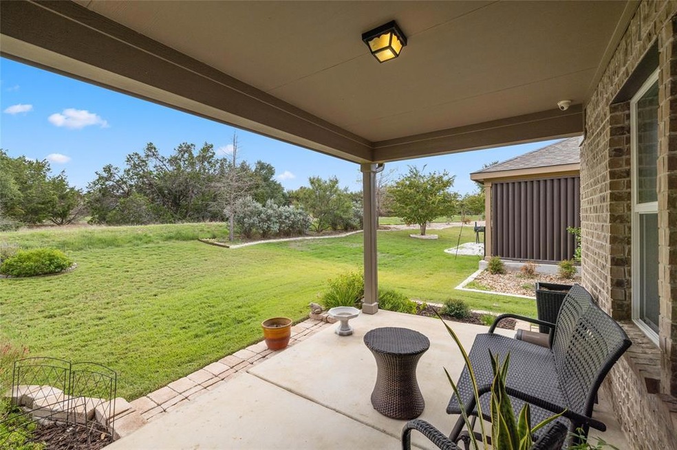 Gorgeous greenbelt views from the comforts of your covered back patio.