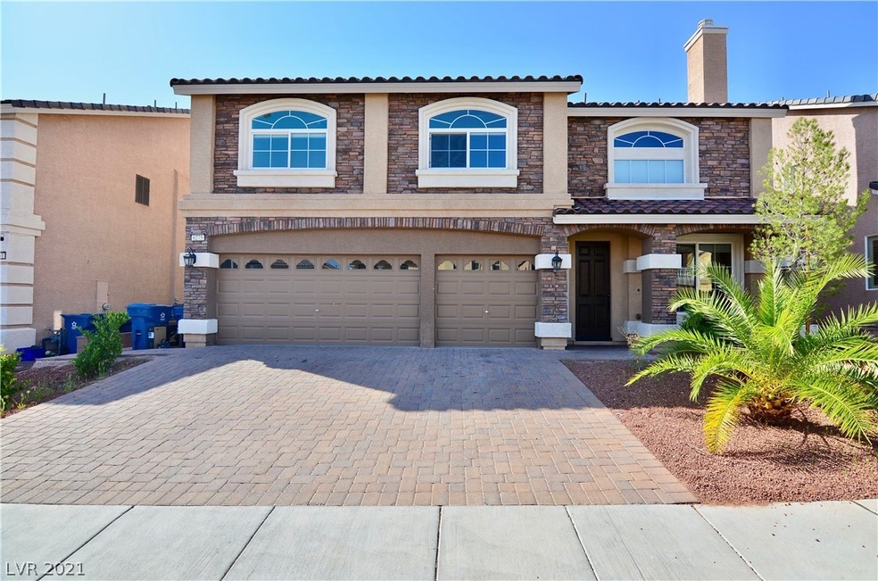 Gorgeous Rock Facing and pavers driveway.