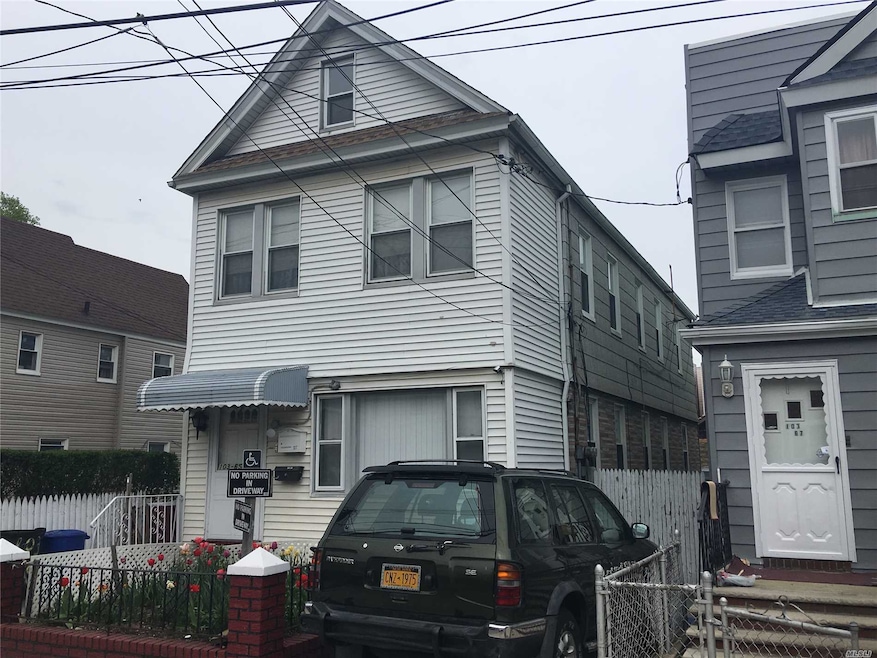 10365 103rd St, Ozone Park, NY 11417 - photo 1