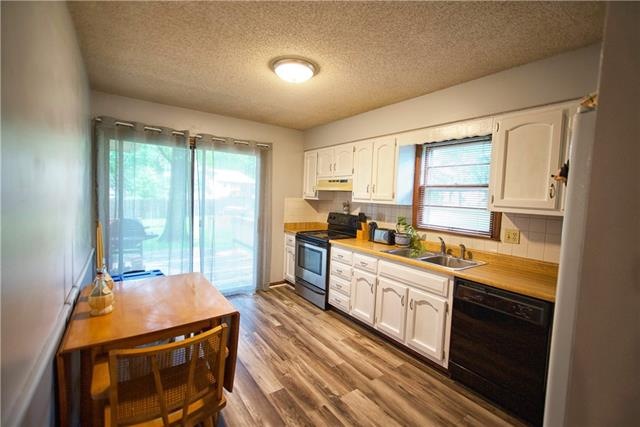 New Painted Cabinets & New flooring.