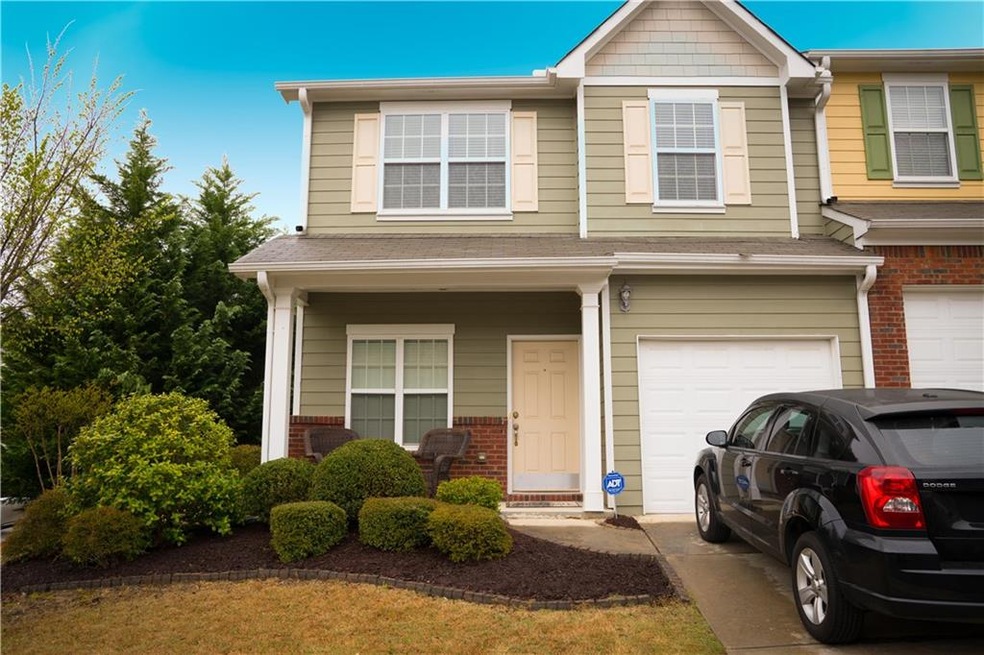 End-Unit Townhouse with Mature Landscaping!