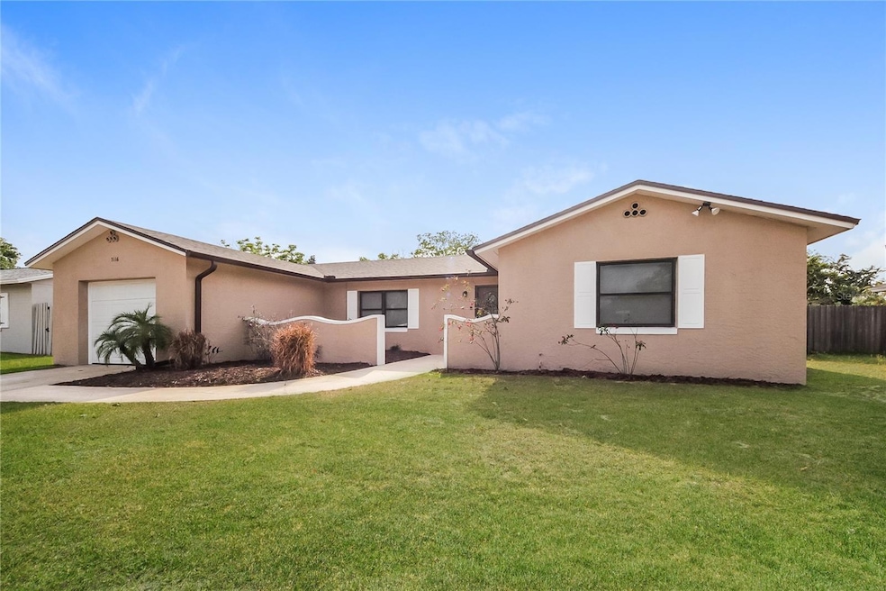 5116 N Woodcrest Dr, Winter Park, FL 32792 - photo 1