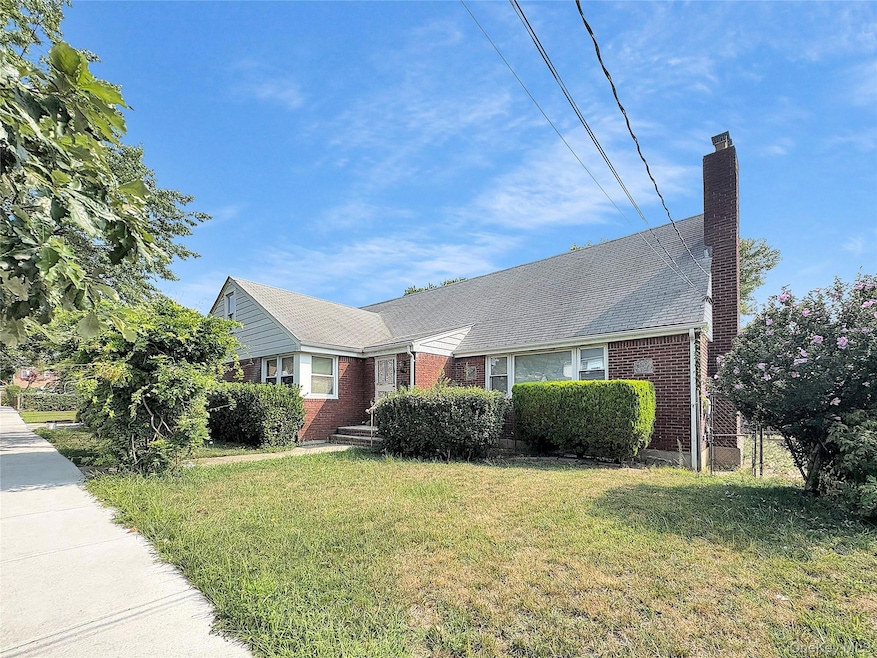 11839 205th St, Saint Albans, NY 11412 - photo 1