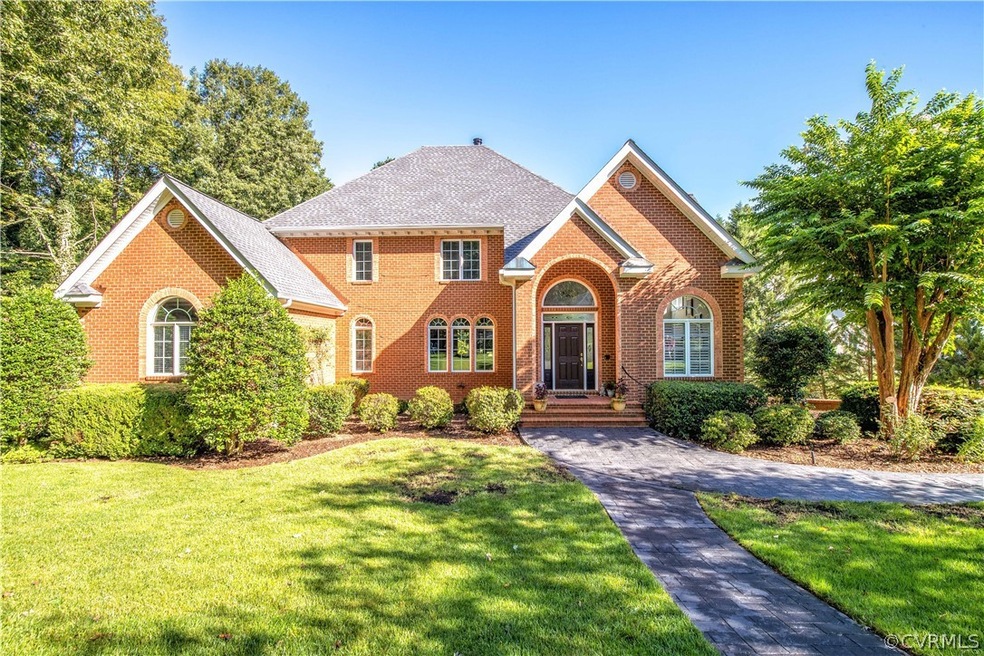 Welcome home to 5308 Beechwood Point Court in Wood