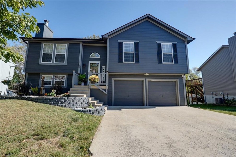 123 S Darrowby Dr, Raymore, MO 64083 - photo 1