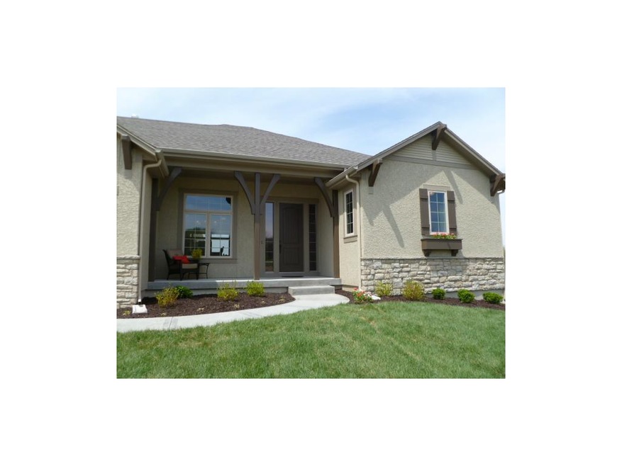 Amazing Curb Appeal!  Front Porch & 3 Car Garage!