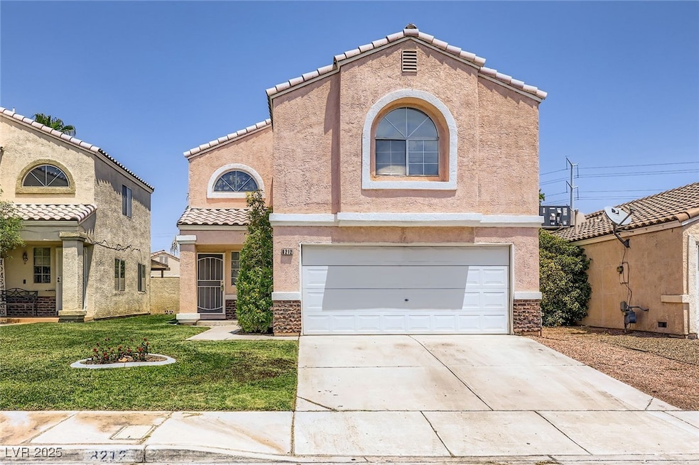 Mediterranean / spanish-style house with driveway,