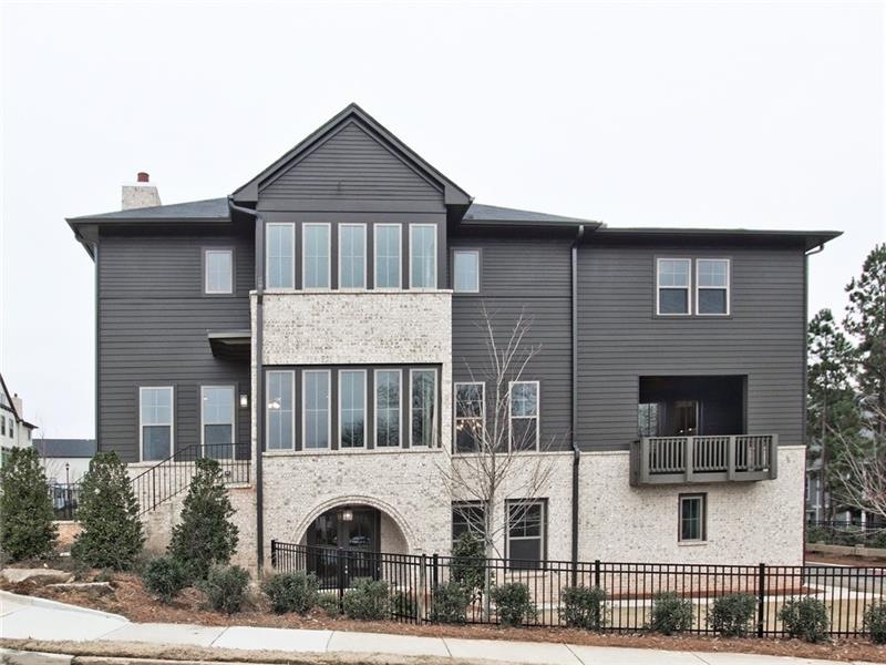 Welcome home! This amazing end unit townhome is mo