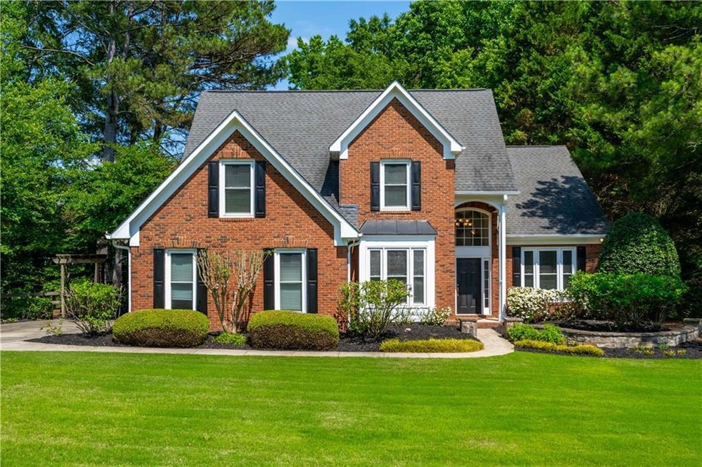 View of front of property with a front yard