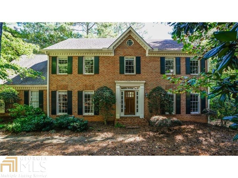 Gorgeous brick home in popular Chimney Lakes neigh