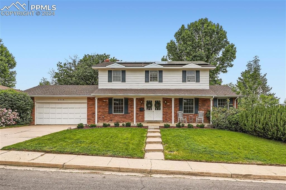 View of front property featuring covered porch, a 