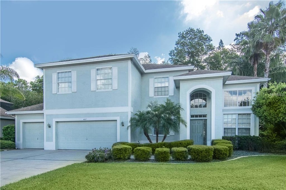 417 Pinewood Drive is everything you need in a family home.  Located on a premium private conservation lot in The Woods of Forest Lakes.