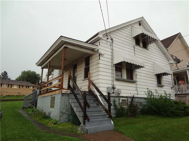 Exterior Front. Covered Front Porch leads to the f