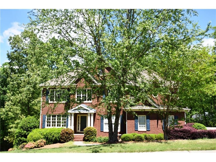 1110 Longpointe Pass is brick front and hardiplank