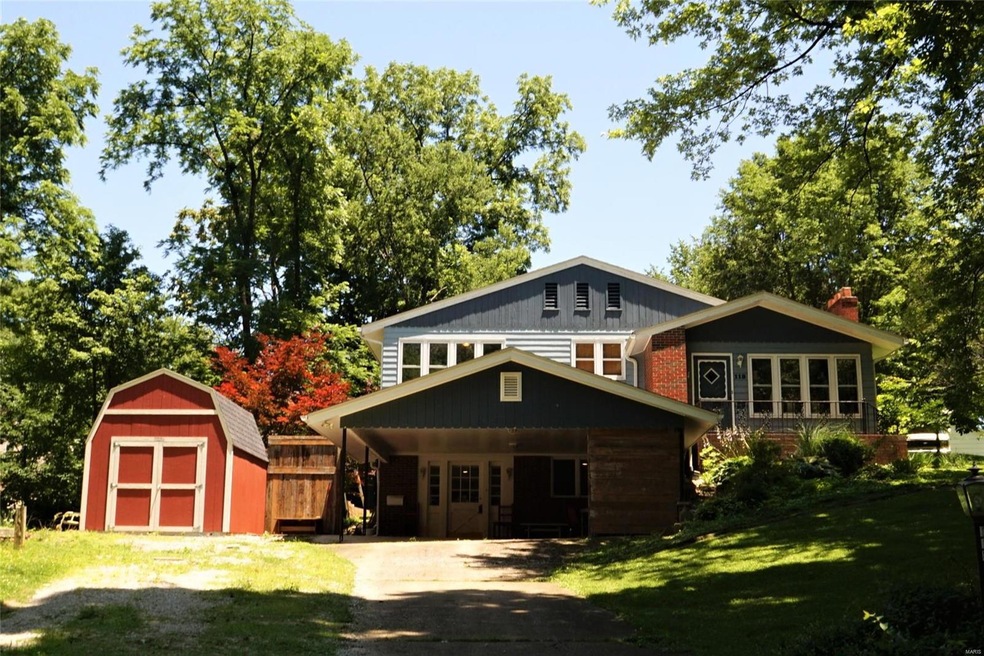 Front View of Home with Covered Parking Space