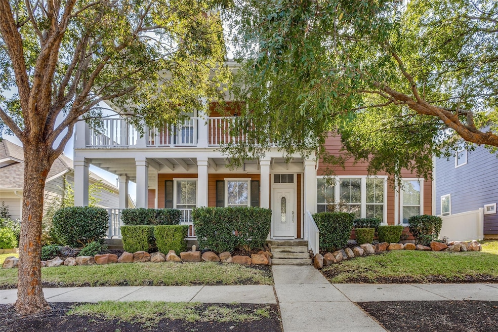 View of front of house featuring a balcony