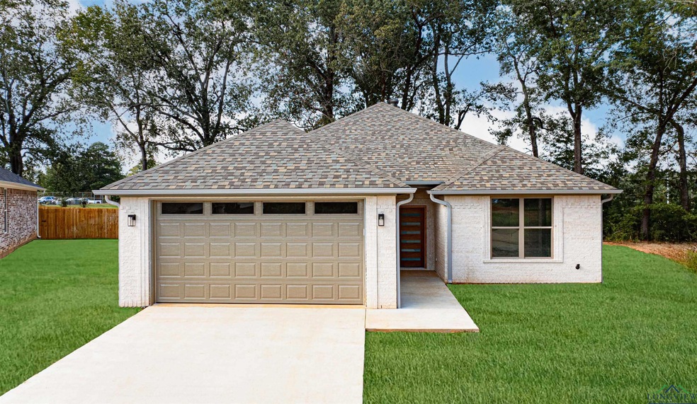 Ranch-style house with a front yard and a garage