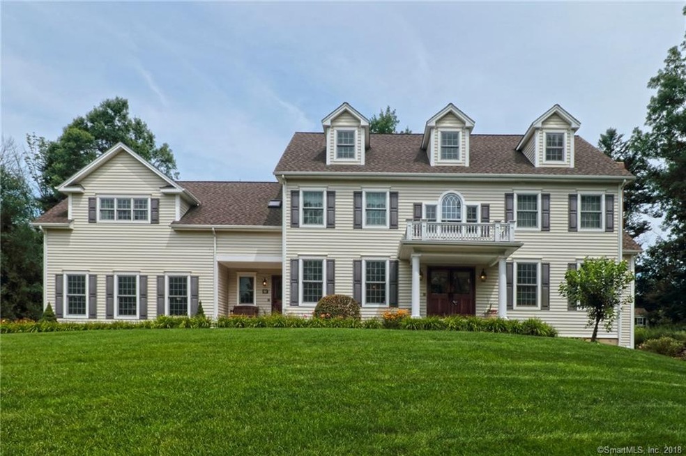 Private drive leads to this stately 5000
