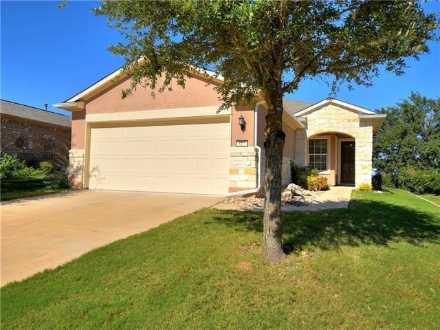 Backing to a Sun City greenbelt, this 