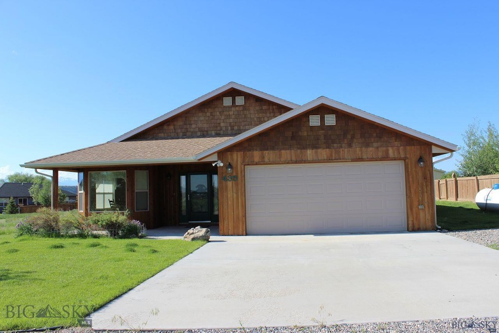Concrete driveway to the 2-car garage