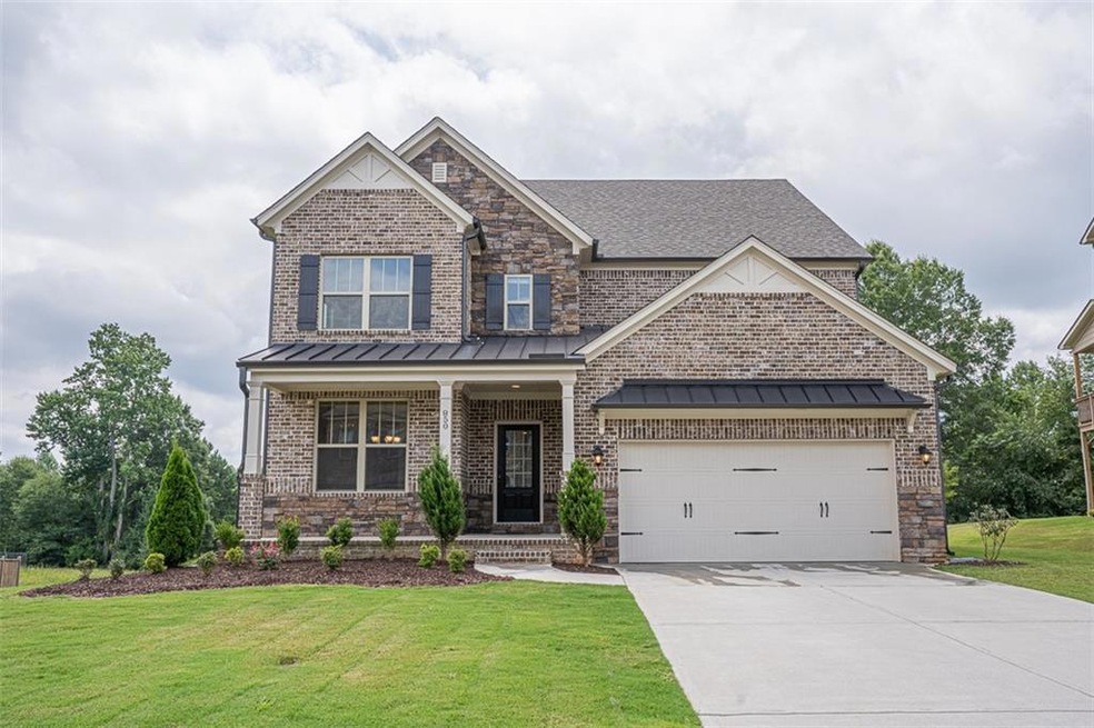Craftsman-style house featuring a garage and a fro