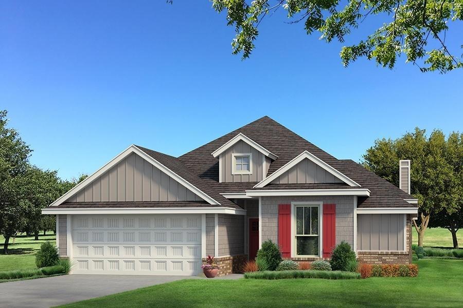 Craftsman inspired home with a front lawn